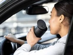 Fellow | Carter Move Mug W. Slide-Lock Lid - 12oz(Fellow Carter Move Mug W Slide Lock Lid 12oz) 2 Fellow | Carter Move Mug W. Slide-Lock Lid - 12oz(Fellow Carter Move Mug W Slide Lock Lid 12oz) -Cafuné Boutique slide lock lifestyle